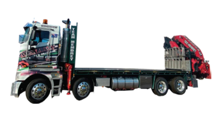 A large flatbed truck with a red hydraulic crane mounted behind the cab. The truck has six wheels and is painted with graphics and text on the cab door.