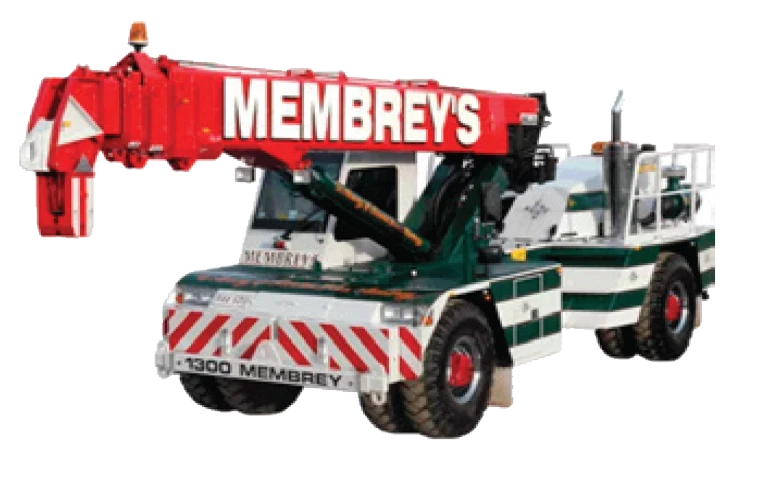 A mobile crane truck with "MEMBREY'S" written on its red boom, green and white body, and striped front bumper.