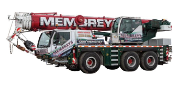A large mobile crane truck with six wheels and a red boom arm labeled "MEMBREY'S." The truck is branded with the company’s name and contact information on the cab and body.
