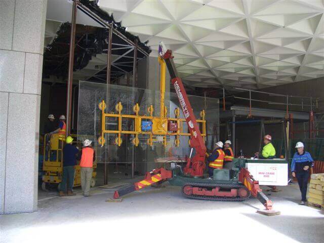 Mini Crawler Crane doing Glass Panels
